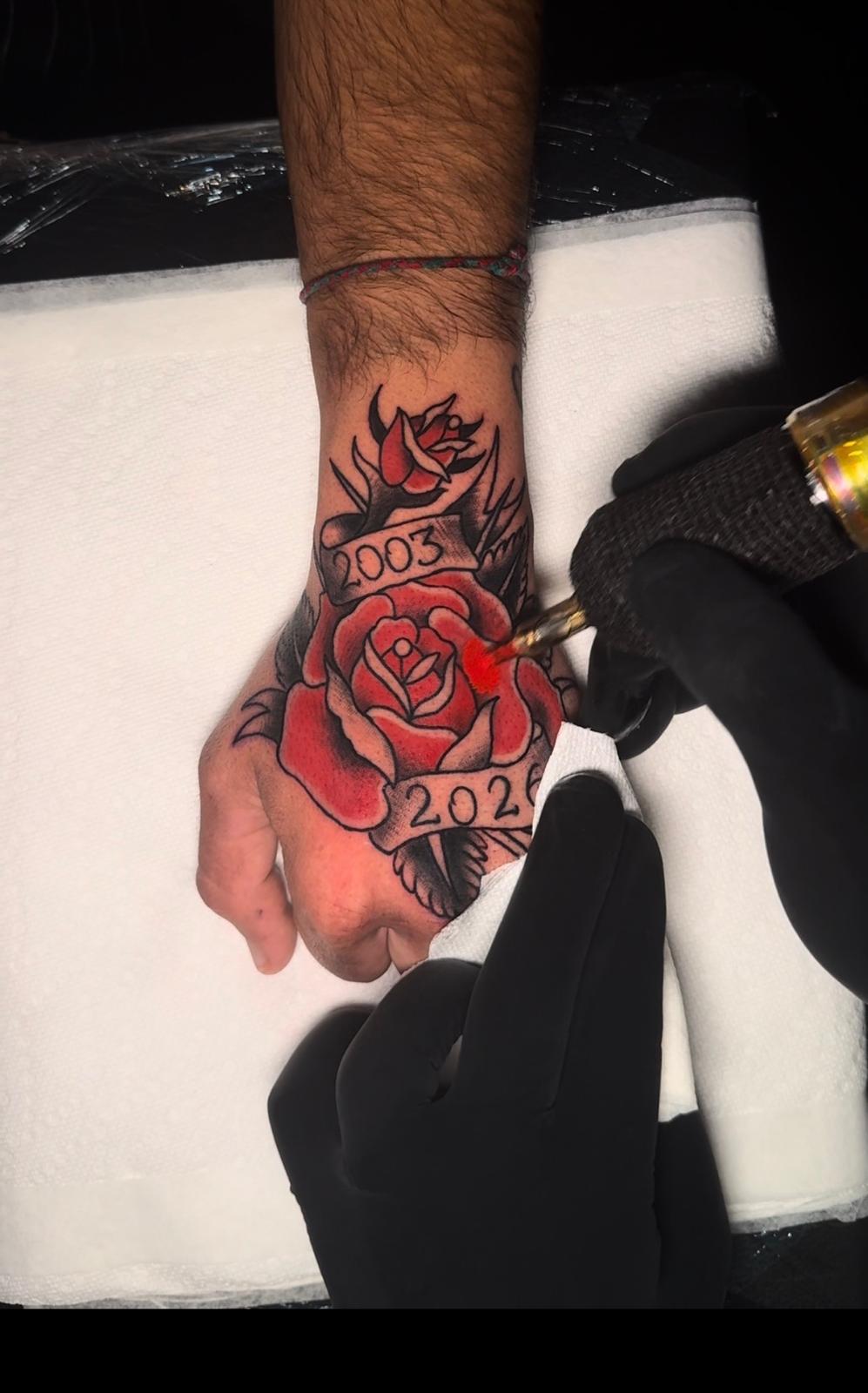 Rose & Banner — Hand
